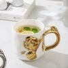 Elegant Porcelain Floral Mug with Golden Handle
