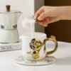 Elegant Porcelain Floral Mug with Golden Handle
